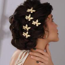 Elegante pinza para el cabello de metal con diseño de mariposa de moda