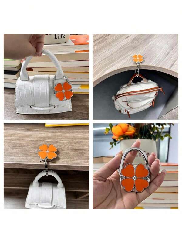 (Diseño nuevo) Gancho plegable para bolso con trébol de cristal naranja, colgador portátil para bolsos