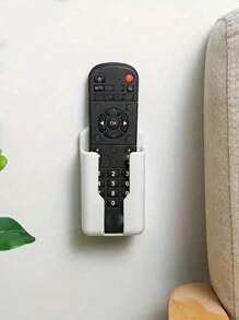 1 szt. Uchwyt na pilota, uchwyt ścienny na telefon i organizer, samoprzylepne pudełko do przechowywania do sypialni, plastikowy stojak ładujący i uchwyt na pilota, montowane na ścianie pudełko do przechowywania pilota do klimatyzatora, silikonowy ścienny uchwyt na pilota do przechowywania, organizer do przechowywania, bez wiercenia, bezwonny, wytrzymały stojak na pilota do telewizora i klimatyzacji