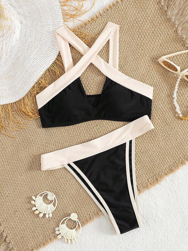 Nuovo bikini alla moda e sexy a due pezzi con dettagli incrociati a contrasto di colore per donne