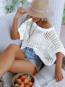 Suéter pulóver de verano elegante para mujer con mangas cortas y diseño calado, utilizado como cubre traje de baño