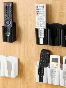 1 szt. Uchwyt na pilota, uchwyt ścienny na telefon i organizer, samoprzylepne pudełko do przechowywania do sypialni, plastikowy stojak ładujący i uchwyt na pilota, montowane na ścianie pudełko do przechowywania pilota do klimatyzatora, silikonowy ścienny uchwyt na pilota do przechowywania, organizer do przechowywania, bez wiercenia, bezwonny, wytrzymały stojak na pilota do telewizora i klimatyzacji