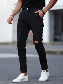 Pantalones jeans ajustados para hombres en denim negro con desgarros, tela suave y elástica, ideales para estilos casuales y modernos - Negro - Ver 1