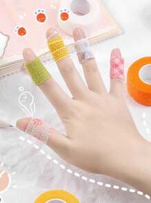 30 peças/25 peças/20 peças/15 peças/10 peças/5 peças/4 peças/3 peças/2 peças/1 peça de cores aleatórias (não apenas incluídas na imagem), ataduras esportivas autoadesivas, tiras de proteção para dedos e pulsos, bandagens elásticas com padrão de desenho animado multifuncionais, estilos longos e curtos, protegendo os dedos do desgaste, curativos fofos para dedos, proteção de dedo para combinação de escrita de estudante, fita adesiva anti-desgaste para as mãos, capas para dedos autoadesivas anti-desgaste e anti-casulo com desenhos animados