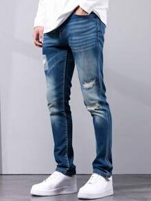 Pantalones jeans ajustados para hombres en denim azul oscuro con efecto de desgaste y rotura, tela suave y elástica, ideales para estilos casuales y modernos - Azul lavado oscuro - Ver 1
