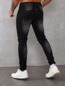 Pantalones jeans ajustados para hombres en denim negro con efecto de desgaste y rotura, tela suave y elástica, ideales para estilos casuales y modernos - Negro - Ver 3