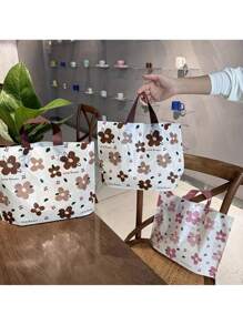 20/50pcs, Mocha Colored Floral Print Tote Bag - Thick, Waterproof, And Reusable With A Pink Handle - Perfect For Retail Displays, Clothing Stores, Jewelry And Clothing Shopping, Daily Handheld Use, Cute Floral Print Pattern, Gift Bag