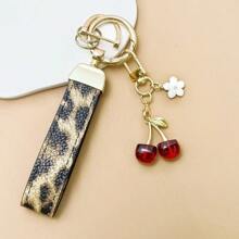 TTOBS 1pc Exquisitely Crafted Leopard Print Leather Car Key Chain With Adorable Cherry Pendant - , Fashionable And Multi-Functional Backpack Keychain - The Perfect Accessory For Backpacks. The Perfect Valentine's Day Gift, Also An Ideal Gift For Your Beloved Girlfriend.
