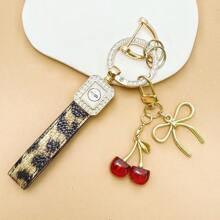 TTOBS 1pc Exquisitely Crafted Leopard Print Leather Car Key Chain With Adorable Cherry Pendant - , Fashionable And Multi-Functional Backpack Keychain - The Perfect Accessory For Backpacks. The Perfect Valentine's Day Gift, Also An Ideal Gift For Your Beloved Girlfriend.
