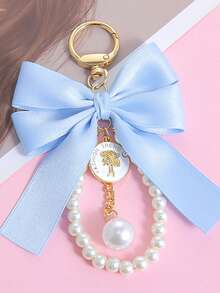 1pc Bowknot Bag Charm, A Bag Accessory, And An Faux Pearl Keychain. It's A Perfect Mother's Day Gift. This Cute Faux Pearl Beaded Bracelet-Style Keychain Exudes A Vintage Charm. It Is Suitable For Decorating Ladies' And Girls' Handbags, Backpacks, And Even Cars. The Pearl Pendant Adorned With A Ribbon Is Also An Excellent Choice For Valentine's Day And Birthday Gifts. - Multicolor - View 27