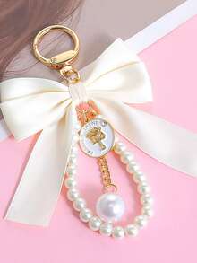 1pc Bowknot Bag Charm, A Bag Accessory, And An Faux Pearl Keychain. It's A Perfect Mother's Day Gift. This Cute Faux Pearl Beaded Bracelet-Style Keychain Exudes A Vintage Charm. It Is Suitable For Decorating Ladies' And Girls' Handbags, Backpacks, And Even Cars. The Pearl Pendant Adorned With A Ribbon Is Also An Excellent Choice For Valentine's Day And Birthday Gifts. - Multicolor - View 29