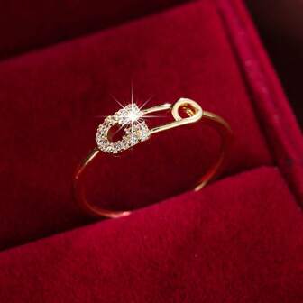 1 pieza Anillo con forma de alfiler ornamentado con circonita cúbica elegante para mujeres