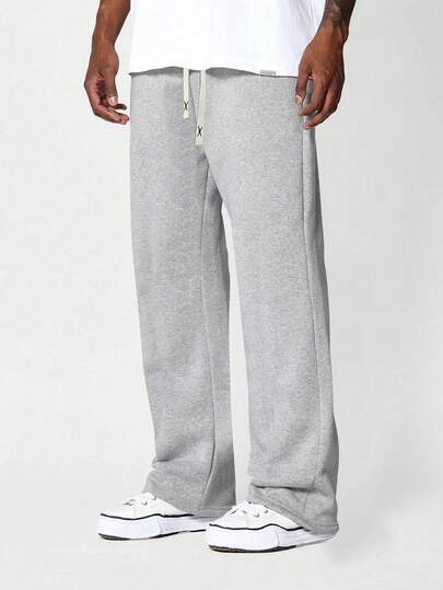 Fritidsbyxor med raka ben för män, enfärgade byxor med dragsko vid ben, enkla och moderiktiga, mångsidiga