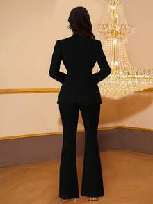 Elegant Women's Black Two Pieces Suit With Rhinestone Embellished Flared Pants And Deep V-Neck Blazer For Party Wear