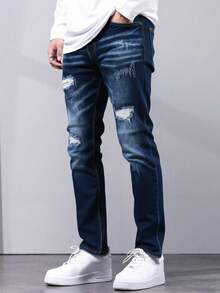 Jeans para hombre en azul oscuro con desgarros, tela suave y elástica, ideal para estilos casuales y urbanos - Azul lavado oscuro - Ver 1
