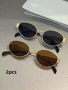 两副女士金属框椭圆形时尚眼镜，适合日常佩戴，也可作为沙滩配饰，是夏季海滩度假、户外活动和旅行的理想之选。