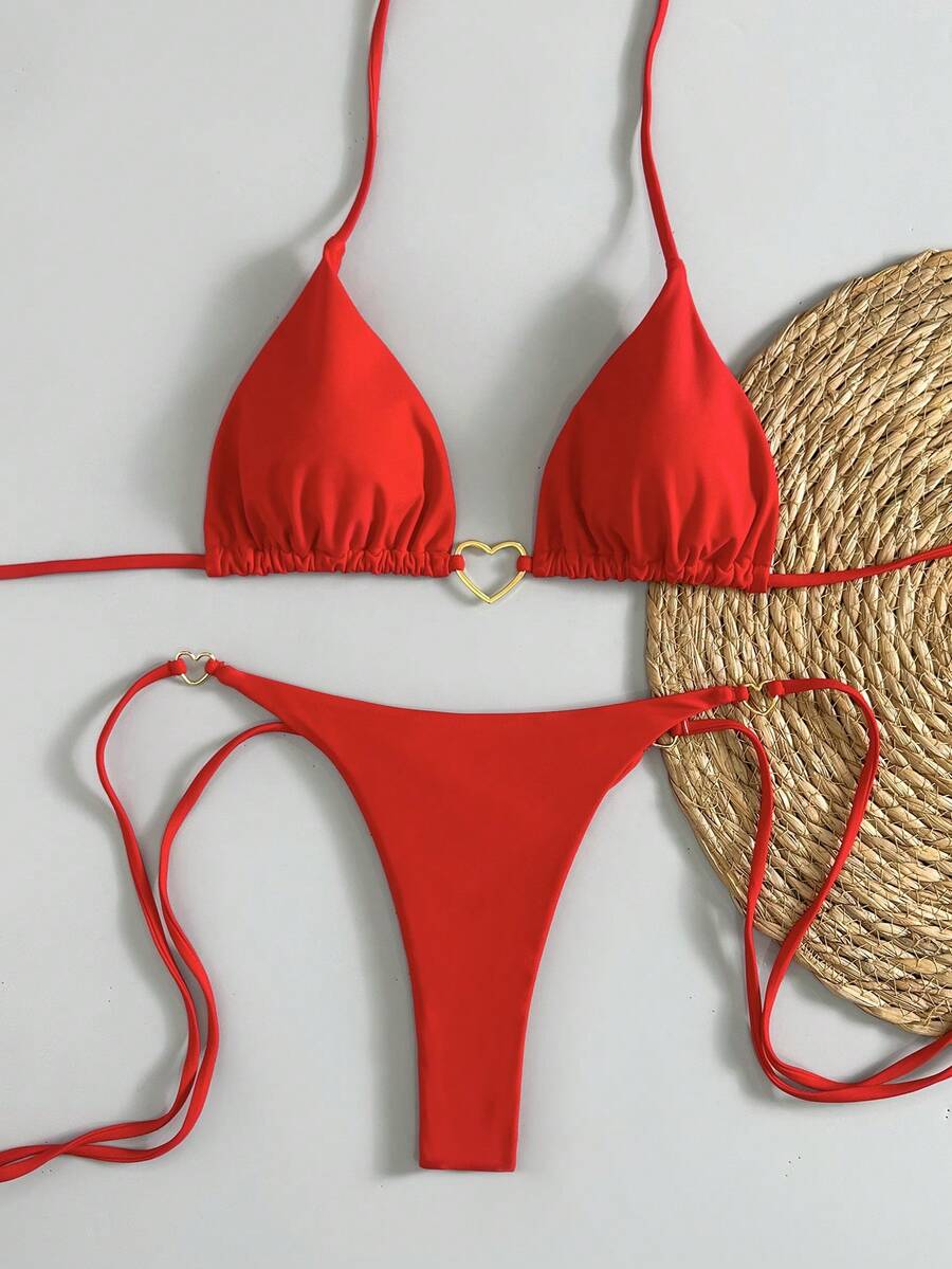 Áo bikini tam giác kiểu Âu Mỹ mới về, điểm nhấn là họa tiết kim loại hình trái tim, cổ yếm, màu trơn gợi cảm, thích hợp cho kỳ nghỉ hè trên bãi biển. - Đỏ - Xem 1