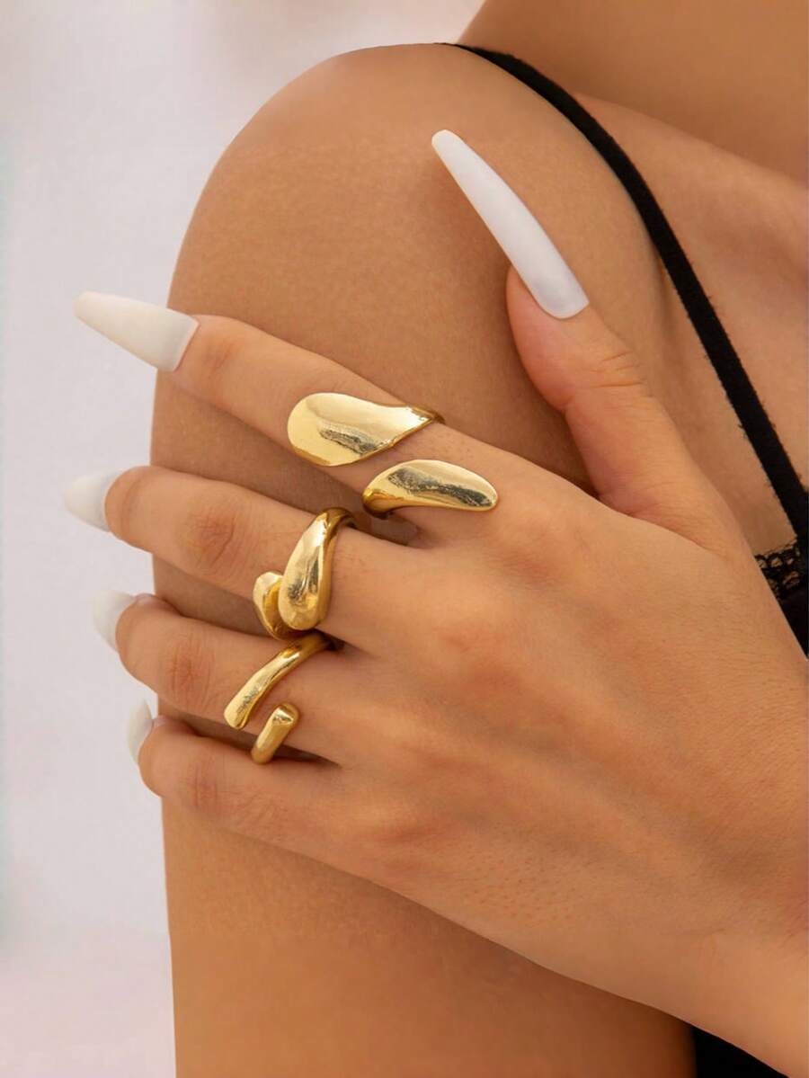 Set de 3 anillos con un diseño de lágrima elegante y versátil, adecuado para que las mujeres los usen en citas, reuniones y fiestas - Anillo de lágrima de oro de 3 piezas (2) - Ver 1