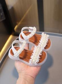 1 paire de sandales classiques pour enfants avec décor de nœud et tour, design plat en PU à lacets, mignonnes sandales bébé convenant aux filles au printemps, été, automne, hiver
