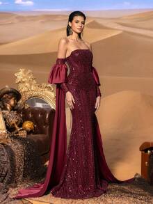 Elegant One-Shoulder Prom Gown: Shimmering Silver, Beaded Accents, Belted Waistline, Floor-Length