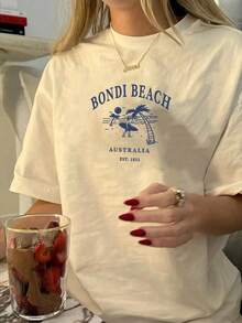 女款夏季 Bondi Beach 印花休閒簡約寬鬆日常街頭風短袖 T-shirt 上衣，女款夏季休閒街頭風上衣，沙灘上衣 - 杏色 - 查看 7