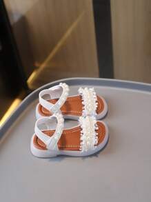 1 paire de sandales classiques pour enfants avec décor de nœud et tour, design plat en PU à lacets, mignonnes sandales bébé convenant aux filles au printemps, été, automne, hiver