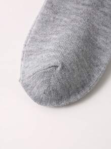 Pacote com 1 par de meias infantis primavera e verão, meias respiráveis de cor sólida com laço decorativo, série clássica preta/branca/cinza, moda, meias versáteis e macias para a pele, para uso diário, presente, volta às aulas