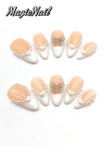 10 Pieces Of Pure Hand-Pressed Wearable Nail, Press On Nails,Nail Supplies,Nails Ptess On,Beach Essentials,25mm Almond Shape, Pink White And White Contrast Color, White Small Pearl And White Heart Shape To Form A Necklace Shape, 3D Bow Ornaments. Spring And Summer Style, Ballet Style. It Is Suitable For Daily Leisure Vacations, And Can Be Worn When Attending Dances, Banquets, Parties And Other Activities.