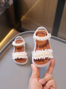 1 paire de sandales classiques pour enfants avec décor de nœud et tour, design plat en PU à lacets, mignonnes sandales bébé convenant aux filles au printemps, été, automne, hiver