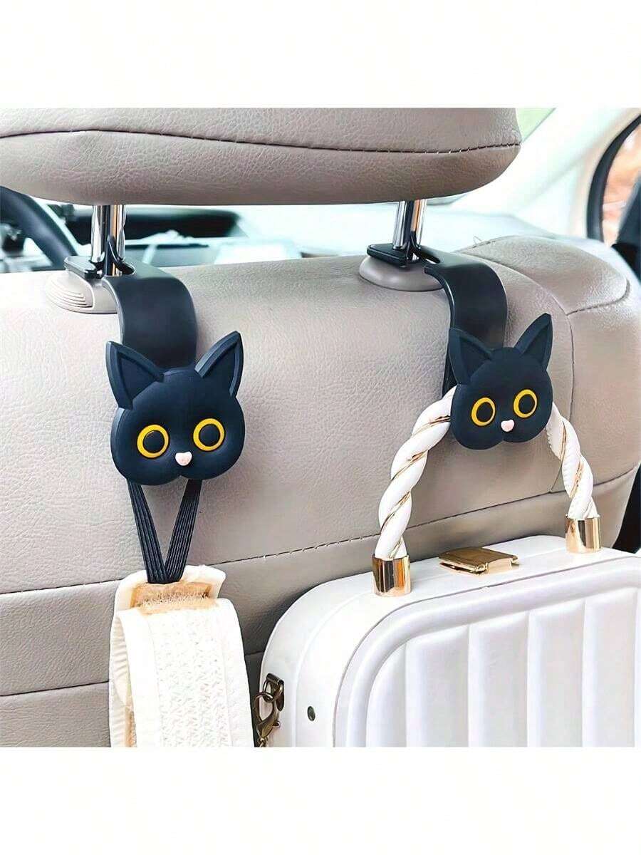 2个3D卡通猫咪汽车座椅头枕挂钩 - 耐用、多功能的汽车内饰收纳挂钩，适用于大多数车型，可固定手提包、钱包、外套、衣物、雨伞、钥匙、玩具和小配件，节省空间，可爱猫咪设计，安装简便，适合大多数车型，是理想的可爱汽车用品礼物。 - 黑色 - 查看 1