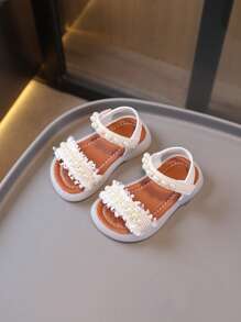 1 paire de sandales classiques pour enfants avec décor de nœud et tour, design plat en PU à lacets, mignonnes sandales bébé convenant aux filles au printemps, été, automne, hiver