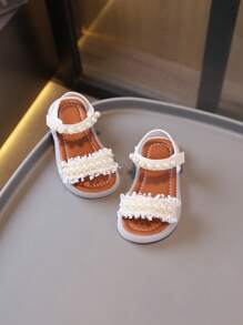 1 paire de sandales classiques pour enfants avec décor de nœud et tour, design plat en PU à lacets, mignonnes sandales bébé convenant aux filles au printemps, été, automne, hiver