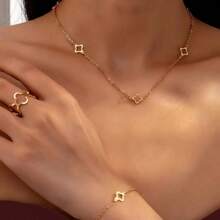 1 Set: 1 Necklace, 1 Bracelet, 1 Ring Hollow Flower Clover Metal Jewelry Set, Elegant And Graceful Jewelry Gift For Women