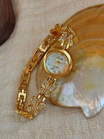 一款法式镀金镶钻蝴蝶造型女士石英腕表，精致优雅，时尚复古，适合日常佩戴、派对、节日等场合，亦可作为腕间配饰、生日或节日礼物。