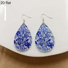 2D Flat Design. A Pair Of Teardrop - Shaped Earrings With Bohemian - Style Colorful Wavy Patterns And Blue - And - White Porcelain Patterns, Incorporating Elements Of Oil Paintings. Suitable For Parties And Music - Themed Occasions.