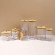 1 pieza Soporte de acrílico para hisopos con tapa de bambú, dispensador pequeño transparente de bastoncillos, contenedor de plástico para palillos de oído, organizador de almacenamiento decorativo para el tocador del baño
