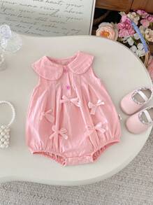 Barboteuse pour bébé fille avec décoration de nœud rose, été