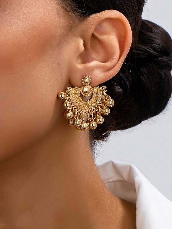 1 pieza Pendientes bohemios vintage con forma de abanico hueco y flecos