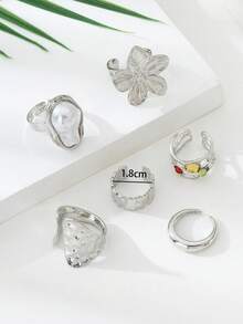 一套 3 枚海洋花朵风格开口戒指，打造时尚叠戴效果