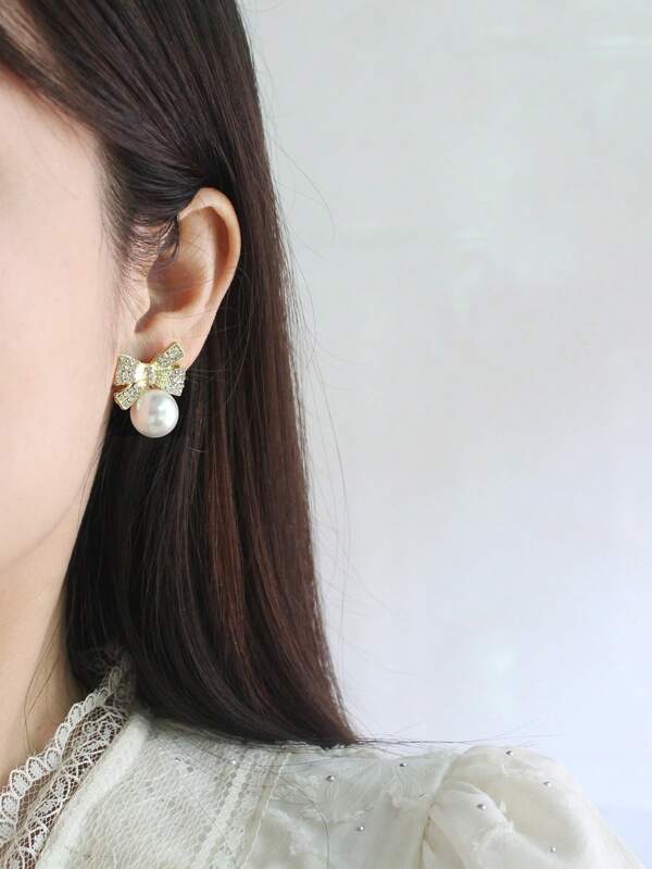 1 par de exclusivos pendientes de lujo con lazo, perlas y adornos de rhinestones