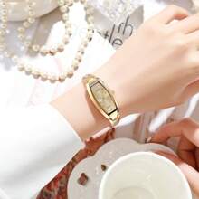 1 pieza Reloj de pulsera de cuarzo de estilo casual y elegante para mujer con esfera decorada con rhinestones y correa de acero, sin estuche de reloj incluido