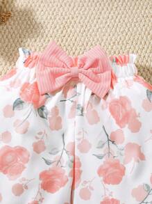 Conjunto de top con aplicación de botones y shorts con estampado floral para niñas, apropiado para uso diario y para exteriores de niñas de 4 a 7 años, para verano