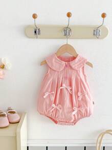 Barboteuse pour bébé fille avec décoration de nœud rose, été