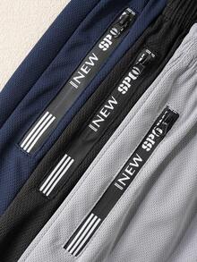 Tween-Jungen 3-teiliges Paket mit lässigen Sportshorts aus Netzstoff mit Grafikdruck und Reißverschlusstasche, geeignet für das tägliche Training, Basketballaktivitäten und den Urlaub - Verschiedenfarbig - Übersicht 3