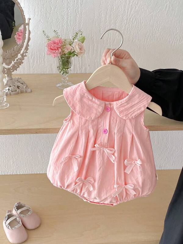 Barboteuse pour bébé fille avec décoration de nœud rose, été