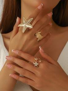 Set de 3 anillos abiertos de metal con strass en forma de estrella de mar en estilo vintage exagerado, adecuado para usar en la playa y vacaciones de las mujeres - estrella de mar - Ver 1