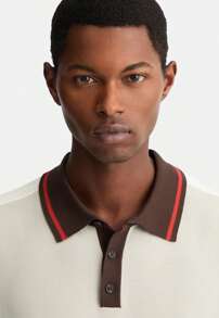 Polo grigia in maglia