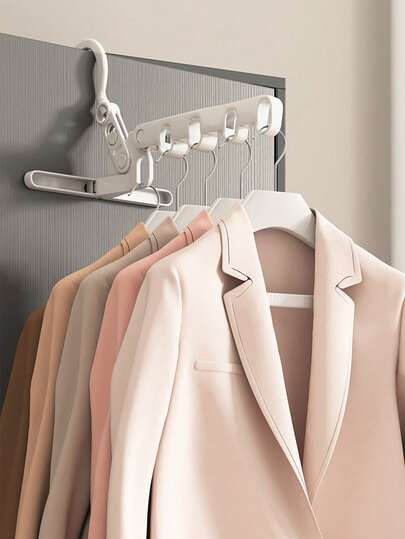 1 ชิ้น ไม้แขวนเสื้อพับได้ในร่ม ไม้แขวนเสื้อพลาสติกติดผนังอเนกประสงค์สำหรับเดินทาง - โซลูชันประหยัดพื้นที่ในอุดมคติสำหรับอพาร์ตเมนต์ขนาดเล็ก, หอพัก, ห้องซักรีด, ตู้เสื้อผ้า และกระเป๋าเดินทาง; ไม้แขวนเสื้อห้าช่องน้ำหนักเบาแต่ทนทานพร้อมดีไซน์พกพา, ติดผนังง่าย, ที่จัดระเบียบเสื้อผ้าอเนกประสงค์, เหมาะสำหรับชุดลำลอง, ใช้ในสำนักงาน, เตรียมวันหยุดตามฤดูกาล และการเดินทางเพื่อธุรกิจ