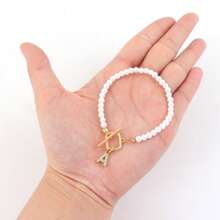 1 pièce Nouveau mode Bracelet perle fausse avec fermoir rectangle en cubic zirconia pavé pour femmes