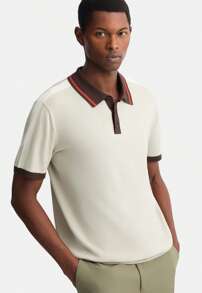 Polo grigia in maglia